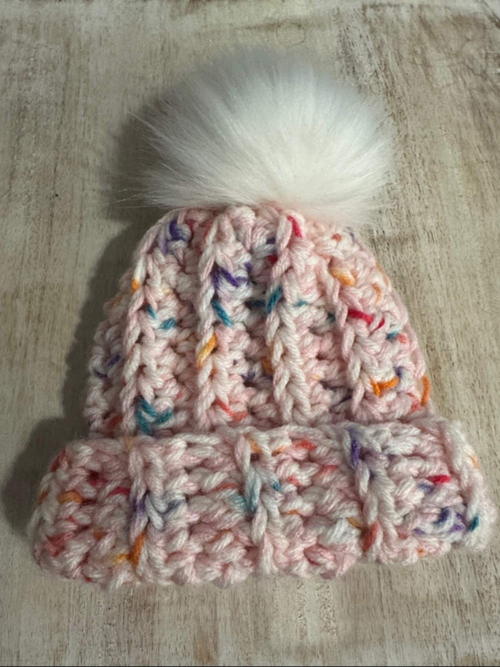 Cozy Pink Confetti Knit Beanie with White Faux-Fur Pom